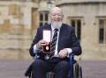 Glastonbury founder Sir Michael Eavis remembered his royal visitors as he was knighted in Windsor. (AP PHOTO)