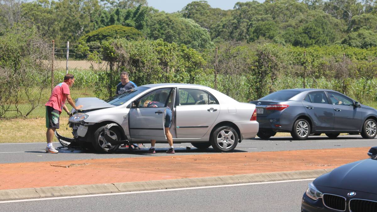 Finucane Road traffic ground to a halt after a car careened across the median strip and hit an oncoming vehicle on Thursday at 1pm. PHOTO: Brian Hurst 
