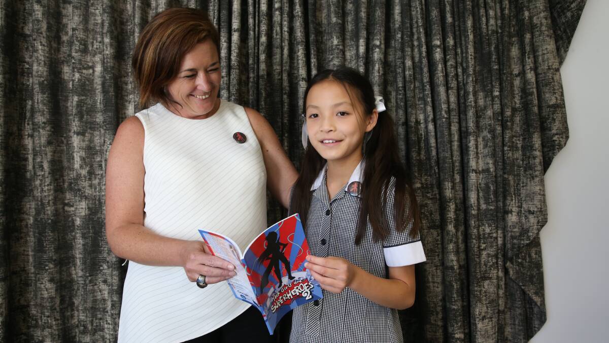 Tech Girl founder Dr Jenine Beekhuyzen with NSW student Emma Yap, 9, who designed a car pooling app in the previous competition. Picture: Louise Kennerley