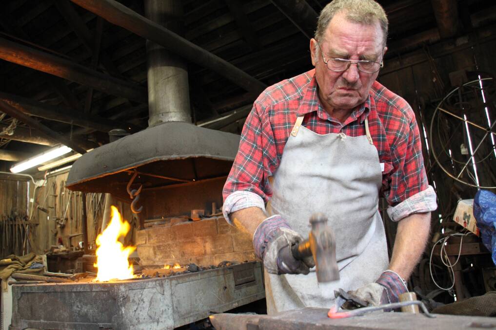 Redland Museum Open Day and official opening of the Australian Toy Hall of Fame: Museum volunteer John Hargreaves in the museum's blacksmith shop. Photo by Chris McCormack