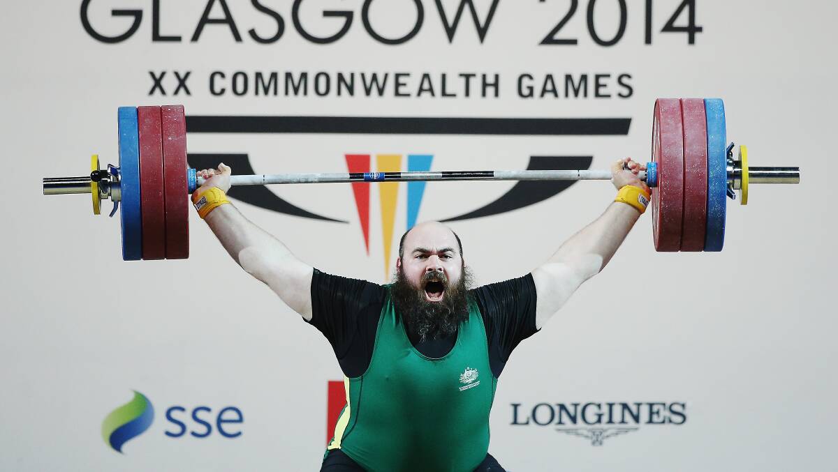  Bronze medalist Damon Kelly of Australia competes in the Men's +105kg final at Scottish Exhibition And Conference Centre during day eight of the Glasgow 2014 Commonwealth Games on July 31, 2014 in Glasgow, United Kingdom.  (Photo by Hannah Peters/Getty Images)