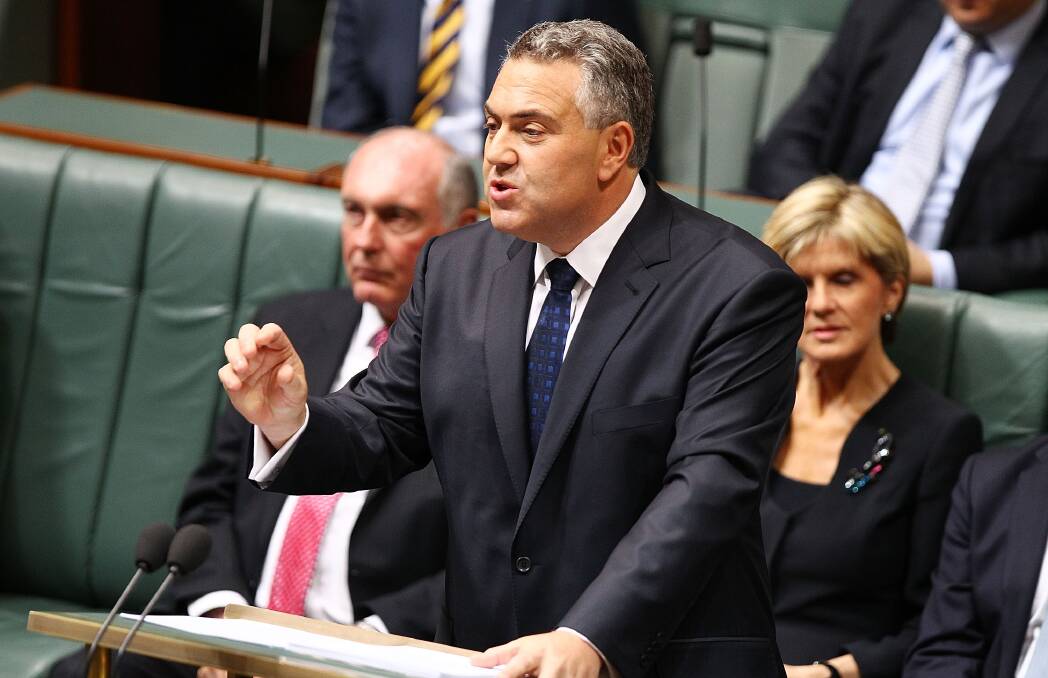 Treasurer Joe Hockey delivers his first budget speech .(Photo by Stefan Postles/Getty Images)
