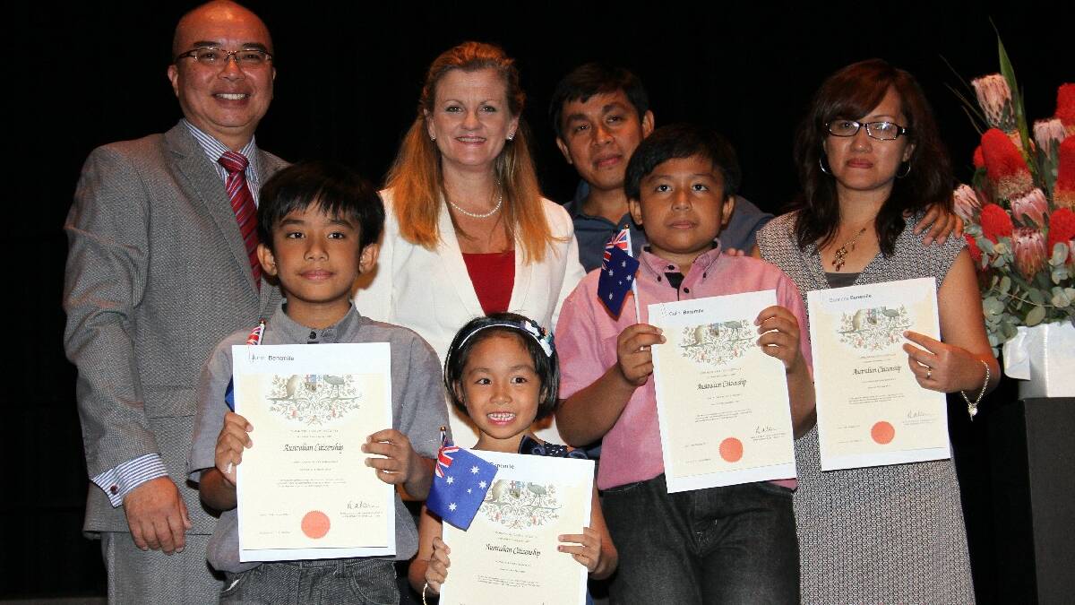 Citizenship ceremony - New citizens take the oath.Photo by Chris McCormack
