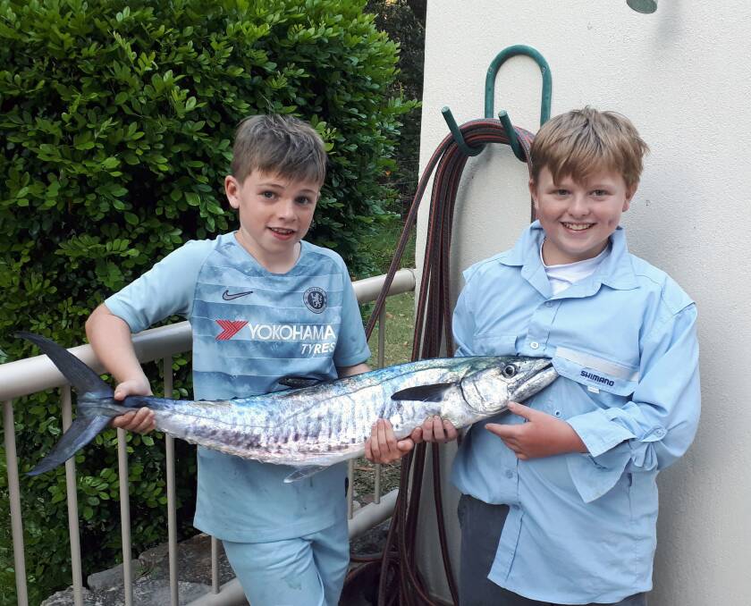 PROUD: Cousins Cooper Hunt-Sharp and Jackson McGarvey were very happy with their 8kg Spanish mackerel caught off Mooloolaba.