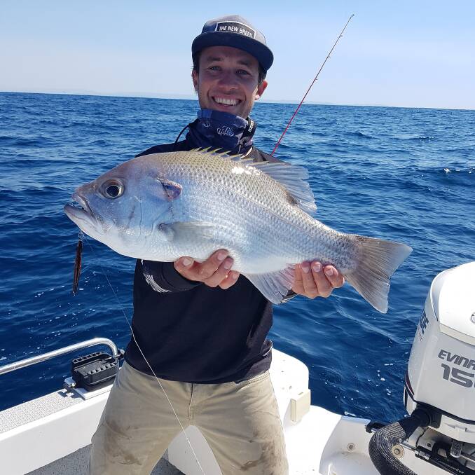 QUALITY: Travis Rasmussen with a quality pearl perch from 80m of water east of Moreton Island.