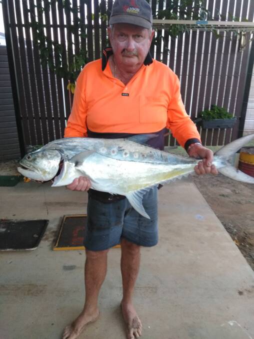 CATCH: Brian Merrett with a solid queenfish caught at Black Rock Creek, north of Mackay.