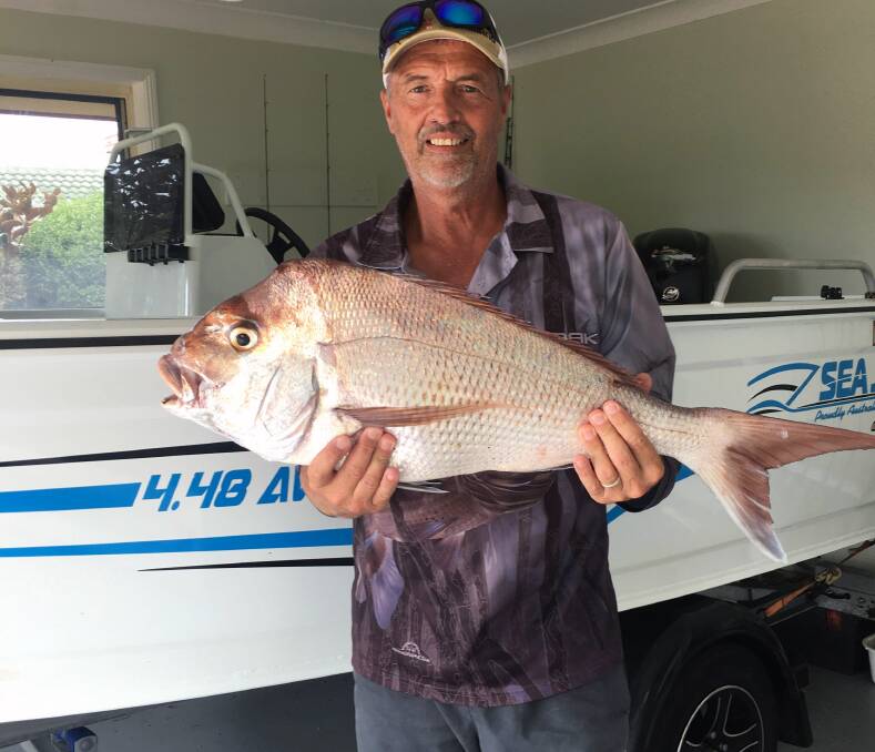 CATCH: Steve Burfoot with a snapper caught on the West Peel Artificial Reef.

