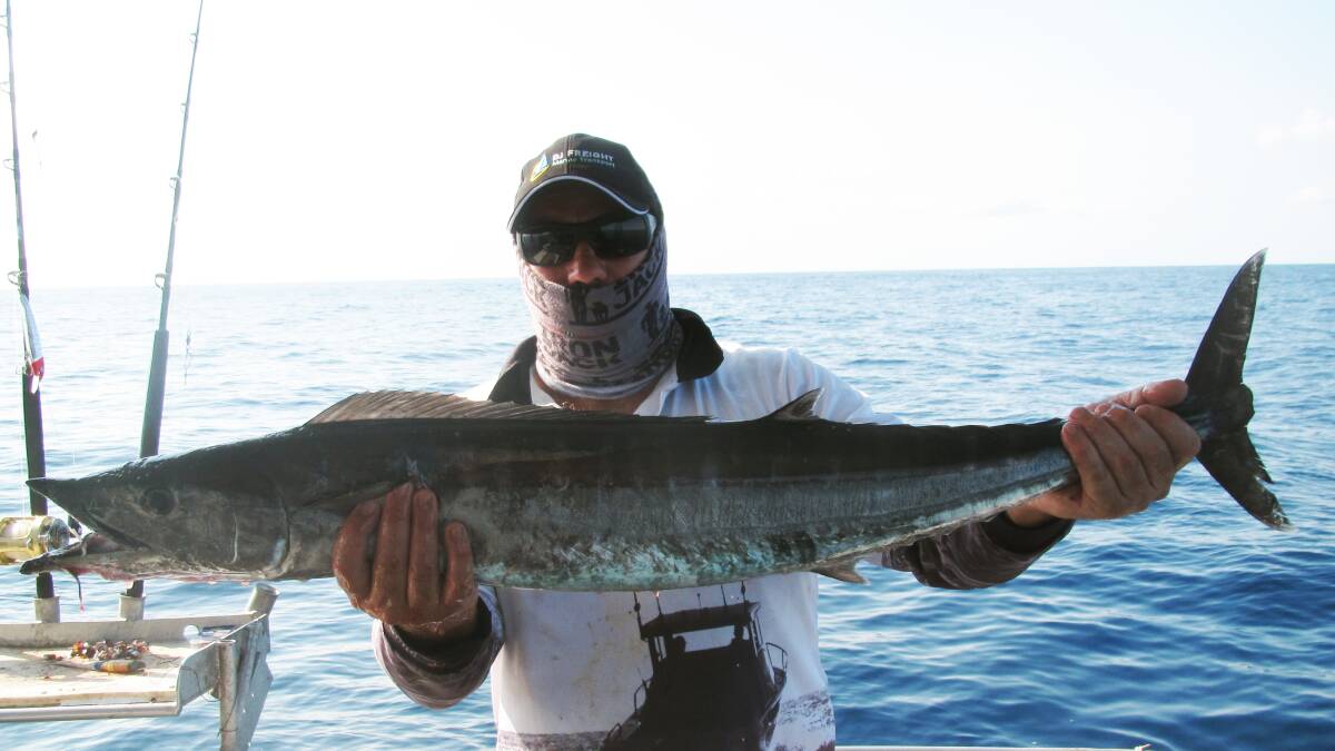 CATCH: Richard Bronner with a Spanish mackerel caught east of Moreton Island onboard Frenzy Charters.