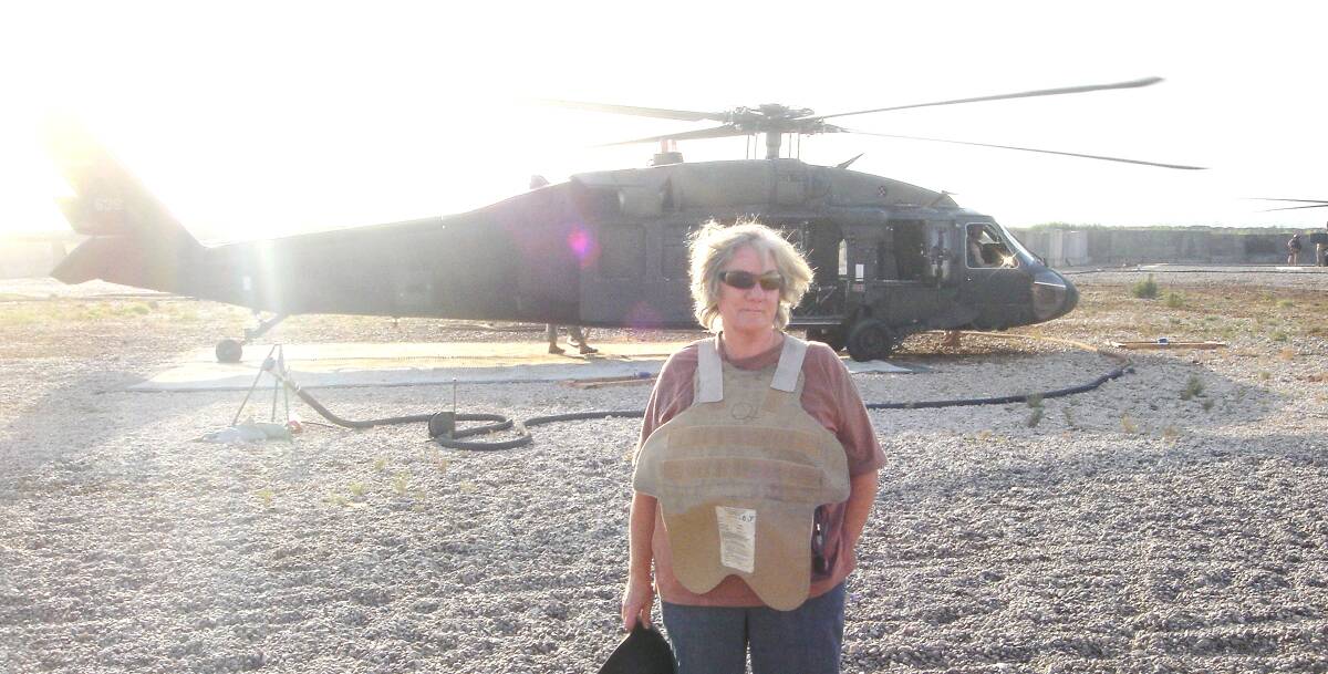 War zone: Cassandra Fletcher about to board a Blackhawk while in Iraq.