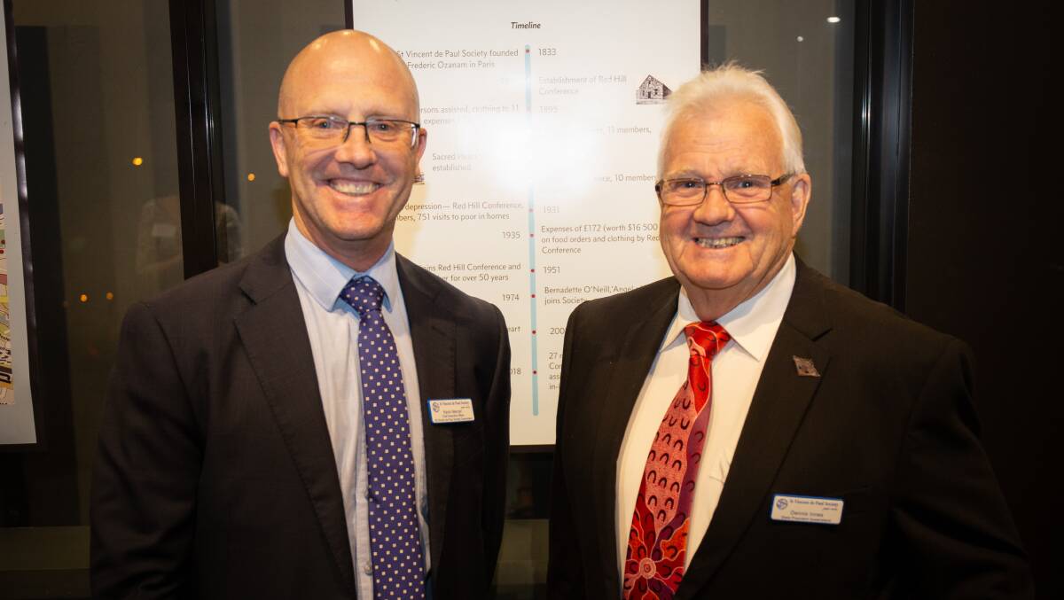 St Vincent de Paul chief executive Kevin Mercer with Queensland state president Dennis Innes