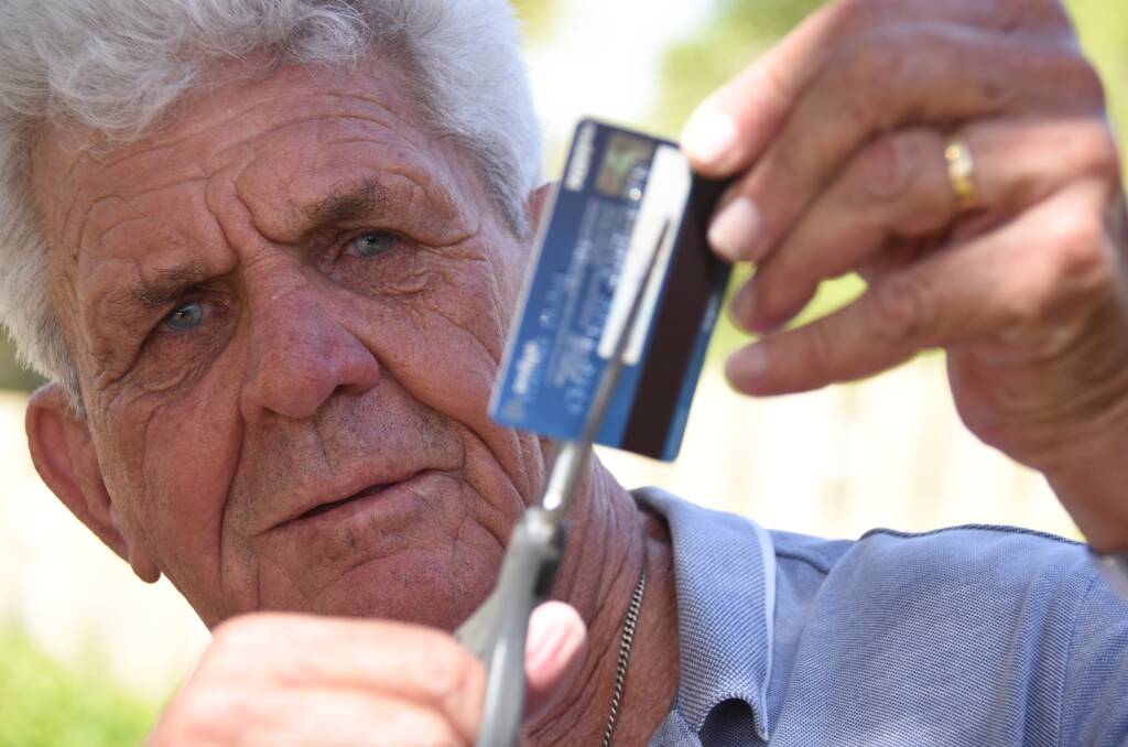 Des Taylor almost fell victim to a phone scam last week, and was told he should destroy his bank card. Photo: Matt McLennan
