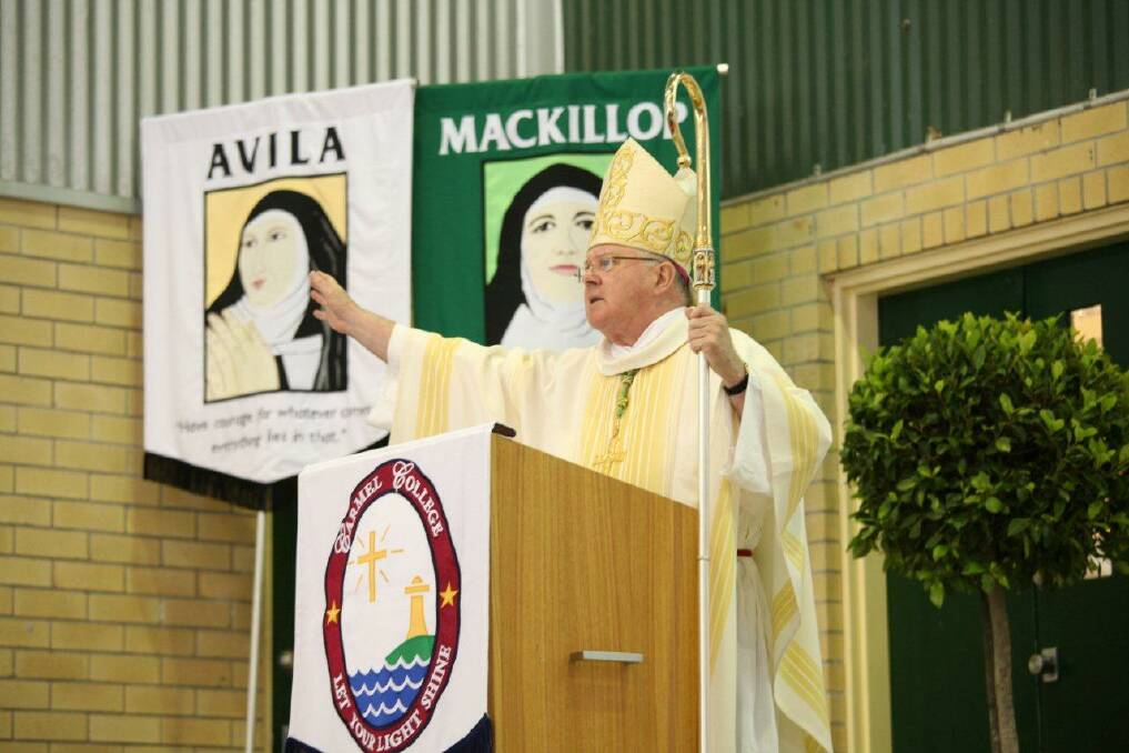 Archbishop Mark Coleridge leads the celebration mass for students, teachers, parents and guests.  