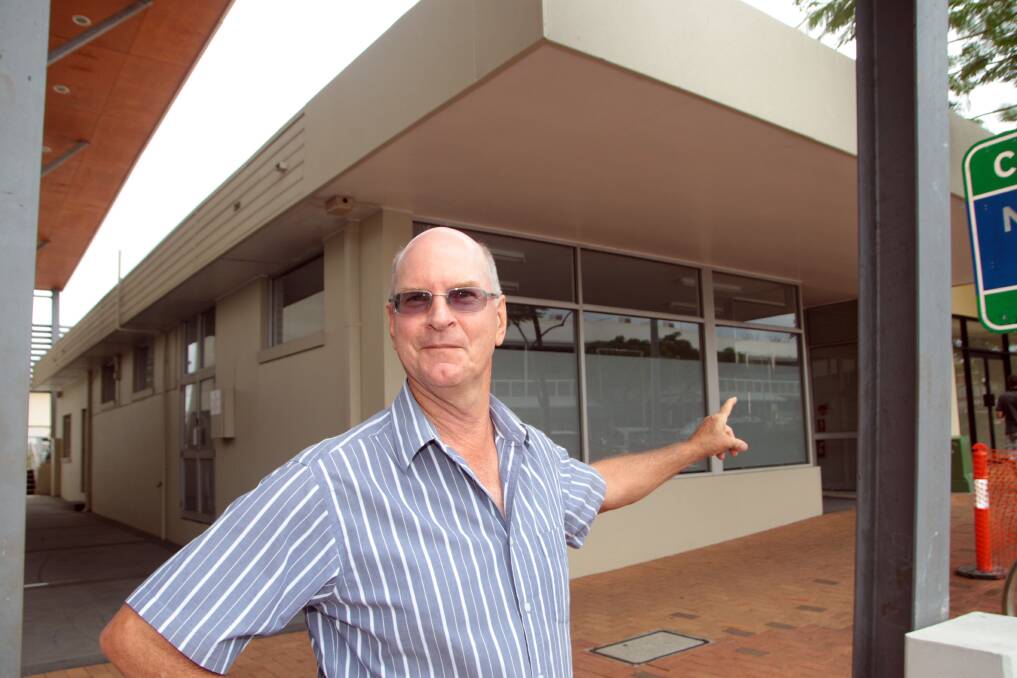 Cleveland property owner Mark Buhmann outside his vacant office space in Bloomfield Street. Mr Buhmann says Cleveland needs to entice government offices and develop a cinema and cultural precinct. Photo by Chris McCormack
