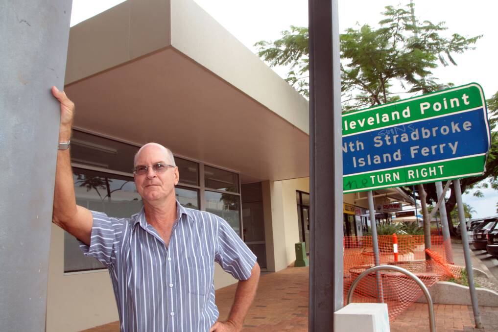 Cleveland property owner Mark Buhmann outside his vacant office space in Bloomfield Street. Mr Buhmann says council needs to consider enticing government offices and developing a cinema and cultural precinct. 
Photo by Chris McCormack