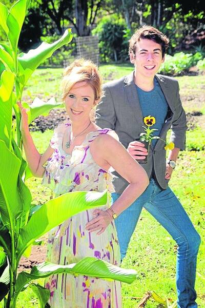 Vivienne Matthews, of Cleveland, and Christopher Coombes, of Mansfield, get ready for an Autumn Splendour Fashion Parade to raise money for a sensory garden at Oaklands Street Community Gardens, Alexandra Hills.Photo by Chris McCormack