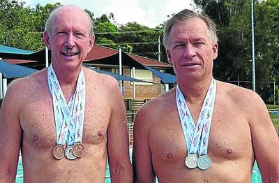 Redlands Bayside Masters Swimming Club members Alan Patterson (left) and Bruce Watt collected a swag of medals at the national championships.