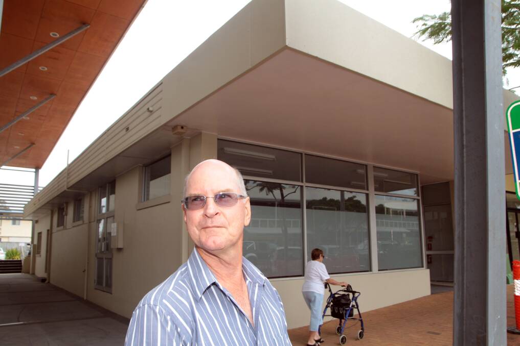 Cleveland property owner Mark Buhmann outside his vacant office space in Bloomfield Street. Mr Buhmann says council needs to consider enticing government offices and developing a cinema and cultural precinct. 
Photo by Chris McCormack