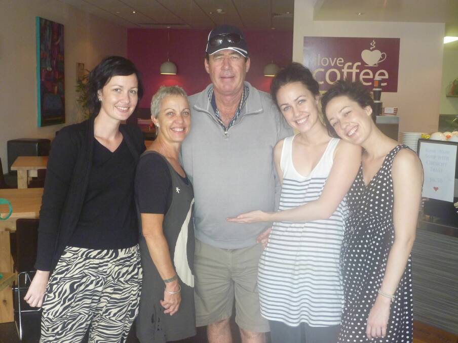 The Stone family ( from left) sister Hannah, mum Jeannene, dad Allan, singer Jac, with sister Sam at Redland Bay s I Love Coffee Cafe at Red Edge.