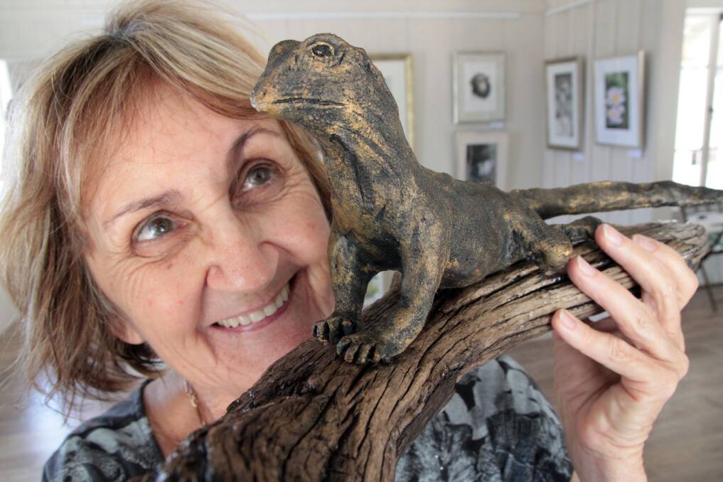 Michele Musgrave, of Ormiston, with her water dragon sculpture to be exhibited at the Old Schoolhouse Gallery.  
Photo by Chris McCormack