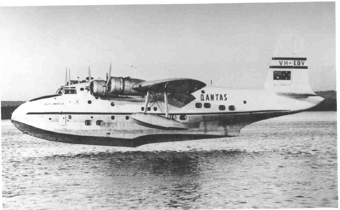 A Qantas Short Sandringham VH-EBV Pacific Warrior flying boat landing at Redland Bay from Sydney after resumption of services to Noumea and Suva in 1953.