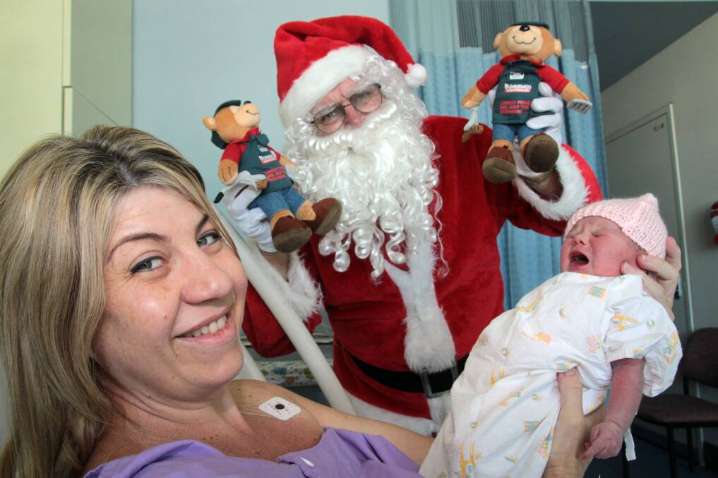 Gina Lofting, of Alexandra Hills, gave birth to Aria Teliah at 9.26am on 12/12/12 at Redland Hospital. Santa also came along giving presents from Bunnings Warehouse.   Photo by Chris McCormack
