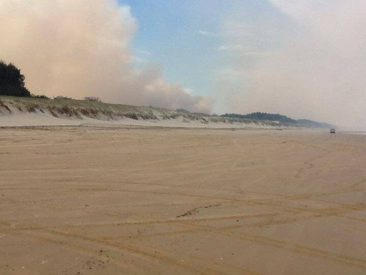 A bushfire on North Stradbroke Island is out. Photo by Queensland Police Service Media.