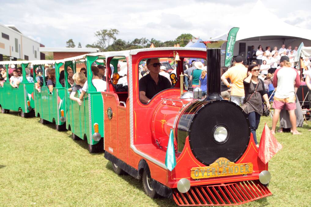 Easter family fun... Thousands of festival goers took a free train ride around the showgrounds.