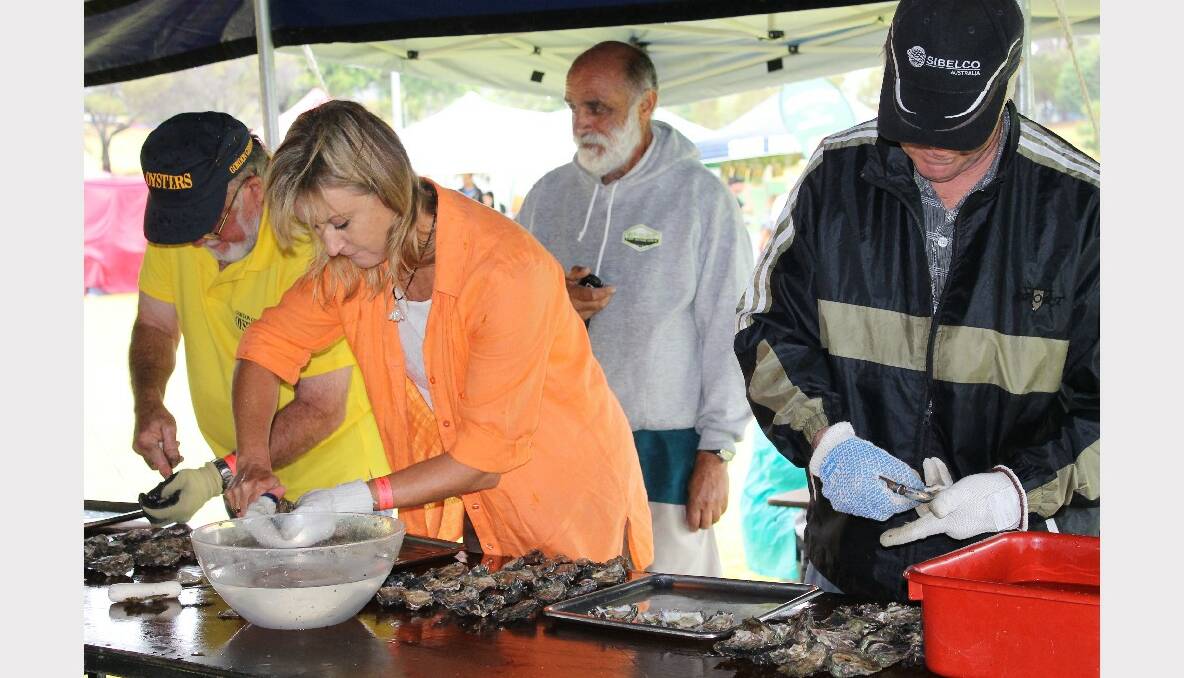 Oyster shucking competition heat.