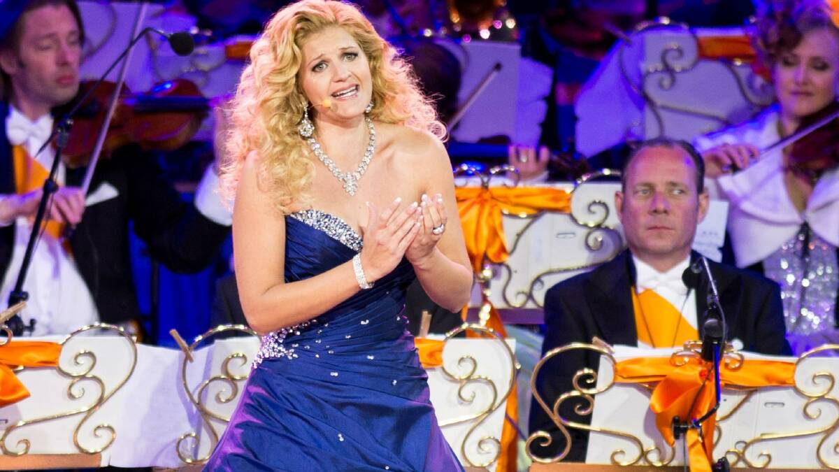 Birkdale Soprano Mirusia Louwerse and Andre Rieu perform on stage at Museumplien during the inauguration of King Willem Alexander of the Netherlands. (Photo by Ian Gavan/Getty Images)