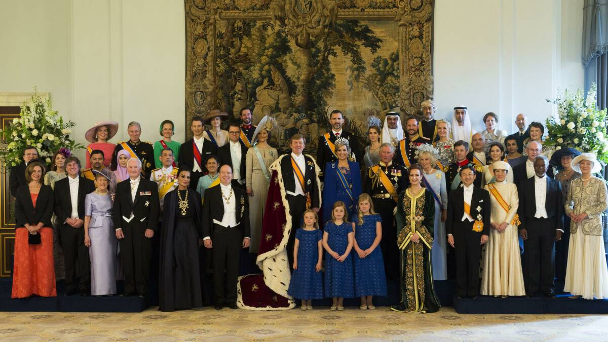 King Willem Alexander and Queen Maxima of the Netherlands pose with guests following their inauguration ceremony, at the Royal Palace on April 30, 2013 in Amsterdam, Netherlands.  (Photo by Pool/Getty Images)