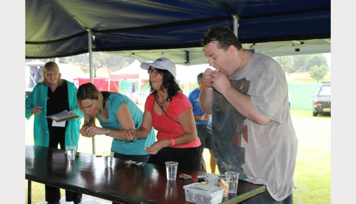 Oyster eating at the Straddie Oyster Festival at Dunwich 
