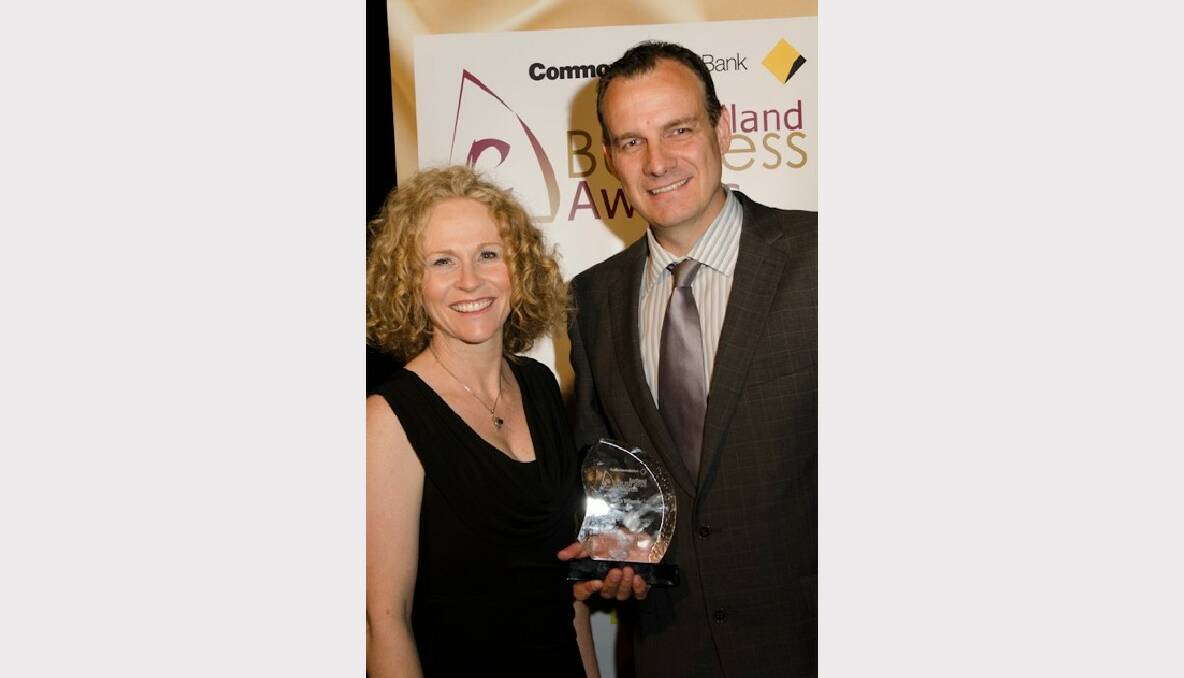 Redland City Chamber of Commerce committee member Anita Beasley with Michael Reid of Transit Systems winners of the Excellence in Excellence in Personal & Other Services  in the 2012 Commonwealth Bank Redland Business Awards.