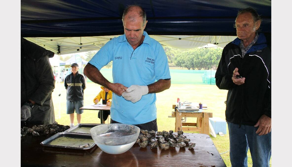 Greg Nankervis shows how to open (shuck) 30 oysters in the Bayside Bulletin oyster shucking competition.  