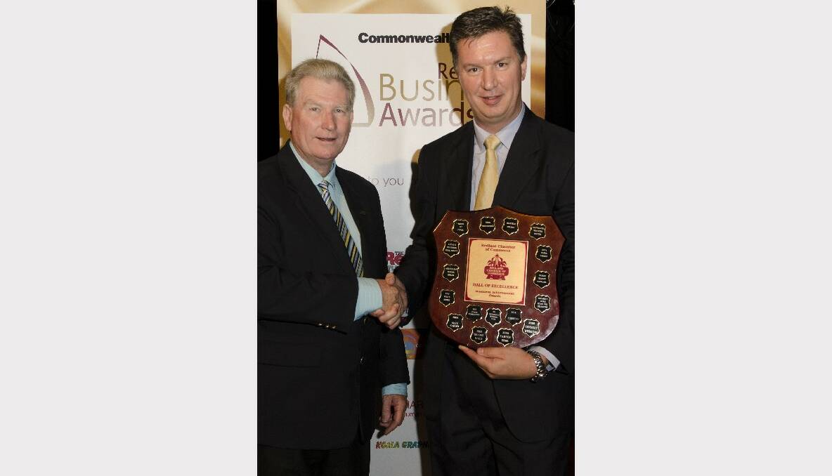 Deputy Mayor Alan Beard helps induct Ian Smits RubbedIn in the Hall of Excellence in the 2012 Commonwealth Bank Redland Business Awards.
