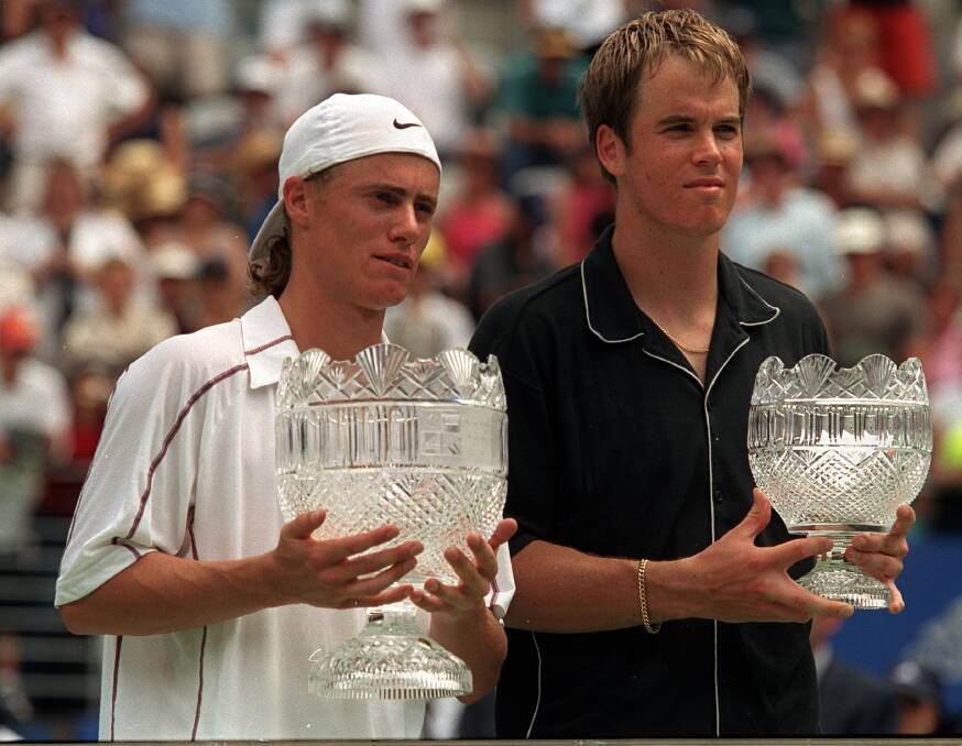 2001: Lleyton Hewitt of Australia and Magnus Norman of Sweeden with their trophies after Hewitt defeated Norman in the final of the Adidas International at the Sydney International Tennis Centre. Photo: Adam Pretty/ALLSPORT