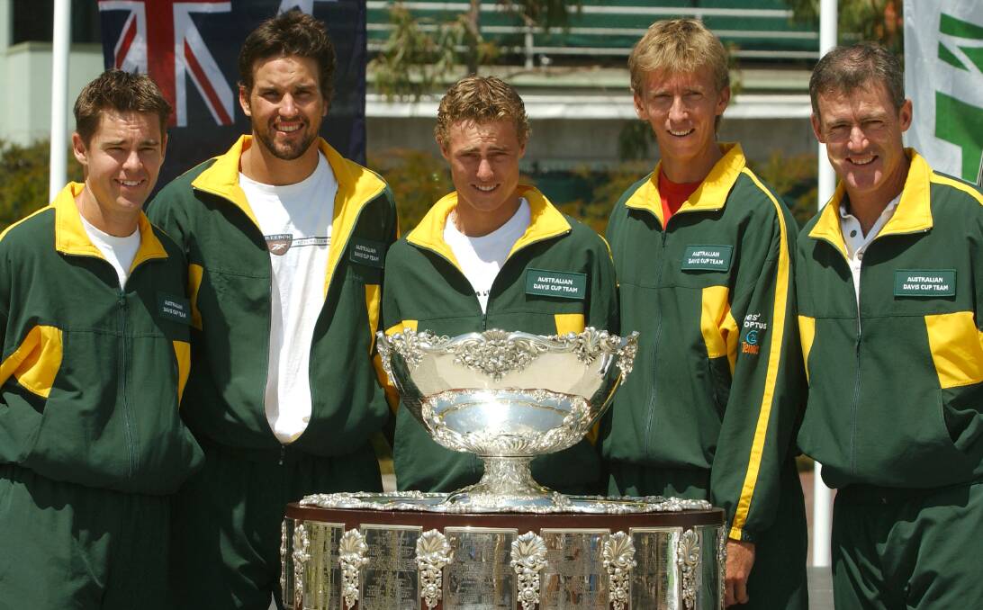 2001: The Australian Davis Cup team, including Hewitt, pose with the Davis Cup. Photo: Nick Laham/ALLSPORT