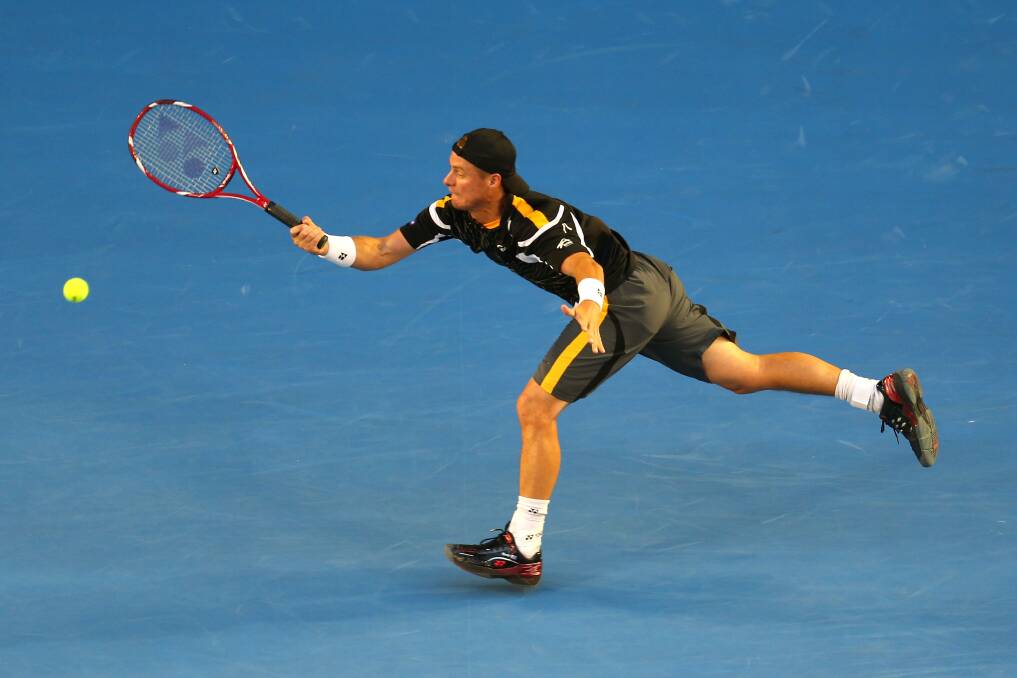 2012: Lleyton Hewitt of Australia plays a forehand in his first round match against Janko Tipsarevic of Serbia during day one of the 2013 Australian Open. Photo by Scott Barbour/Getty Images